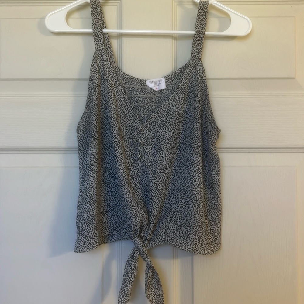 Printed cropped blouse with buttons and tie at bottom